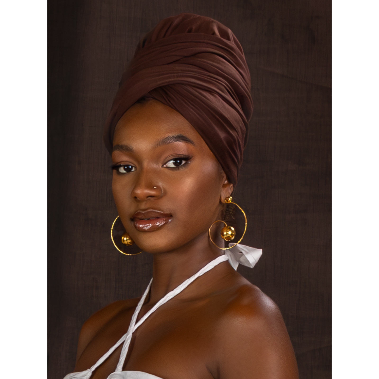 Discover the Orbita Swirl Hoop Post Earrings by JAREDJAMIN Jewelry Online—crafted in 18K gold with artistic spirals, a polished gold sphere, and elegant textured detailing for a sophisticated touch.