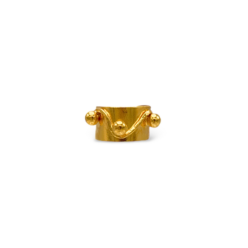 The Gold Chivalry Ring from JAREDJAMIN Jewelry Online features a wide, adjustable band with a raised wavy pattern and three round gold beads, creating a unique crown-like look perfect for any gender.