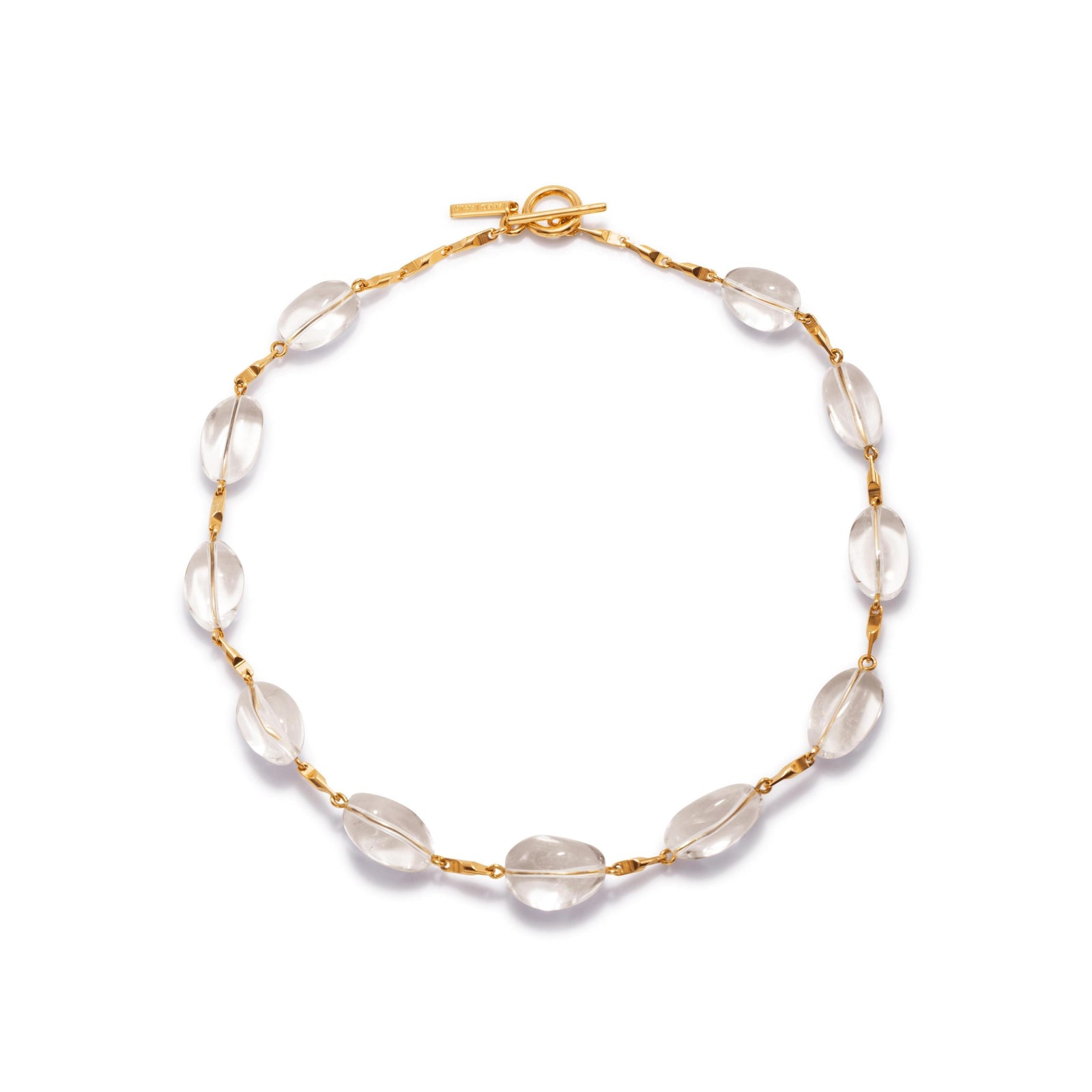 The Arctic Gold Bar-Link Necklace by JAREDJAMIN Jewelry Online features clear Crystal Quartz beads set along an 18K gold-plated chain with a gold toggle clasp, combining alternating gold links and translucent stones for a minimalist, elegant style.