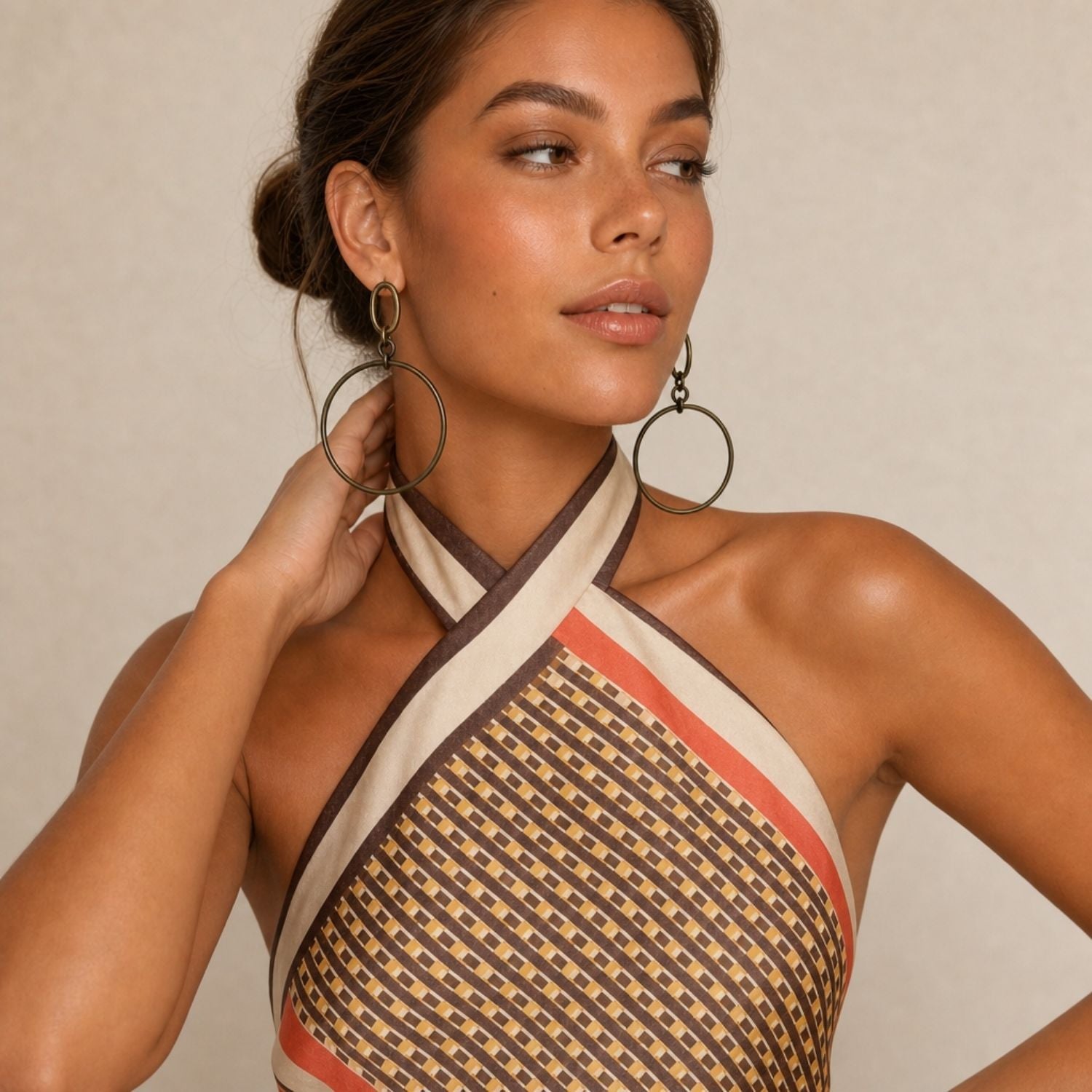 High-resolution studio product shot of the JAREDJAMIN Antique Ophelia Drop Hoop Post Earrings on a white background, highlighting the dark bronze patina on the raw brass oval post and large circular drop.