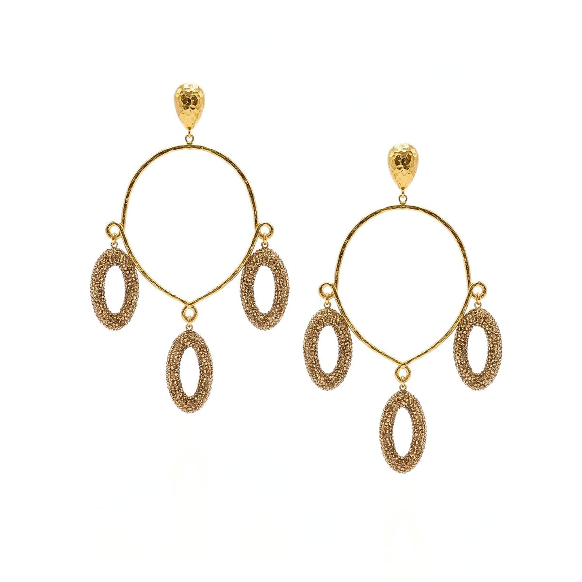 Hand-assembled in our West Hollywood studio, The Aurelia Crystal Chandelier Earrings suspend textured ovals below sculpted gold hoops and a hammered stud. Crafted in small eco-conscious batches. Style Note: punctuates denim or evening silk with equal poise.