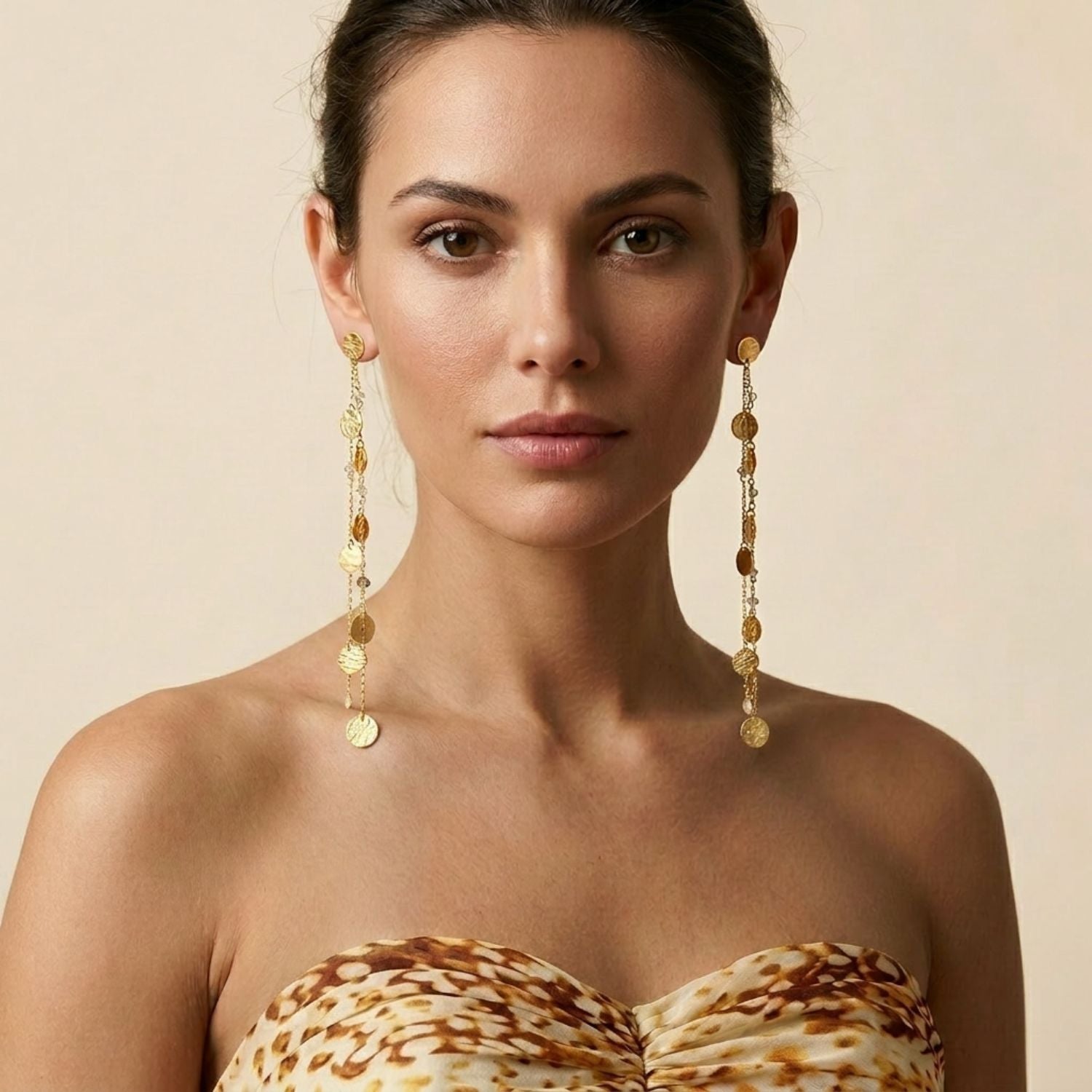 High-resolution studio product shot of the JAREDJAMIN Babylonica Dangle Earrings against a white background, highlighting the 18k gold-plated multi-chain strands, polished discs, and clear crystal accents.