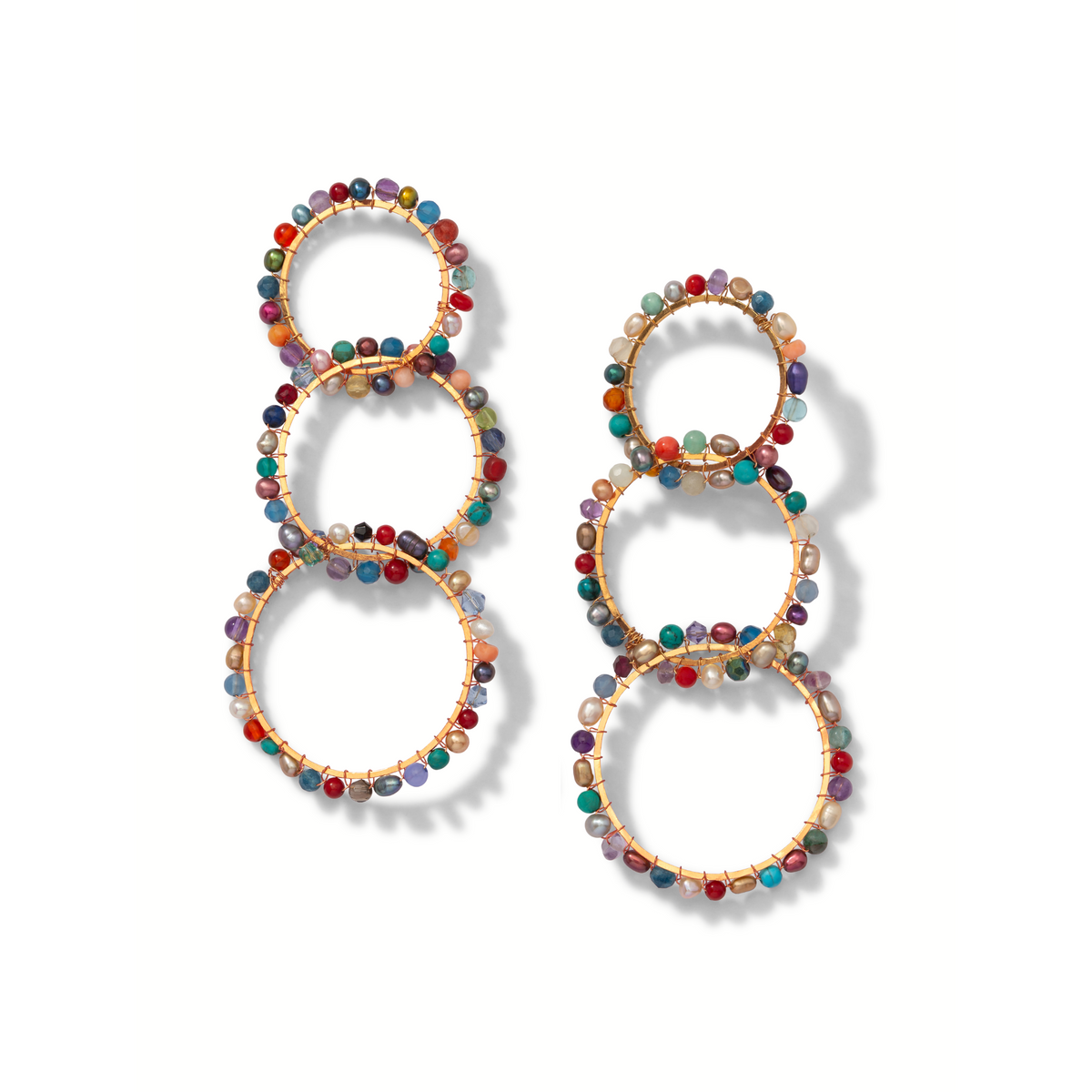 Les Begemmed Lindy 18K or Plated boucles d'oreilles par JAREDJAMIN Bijoux en Ligne présentent three connected créoles adorned avec small round beads et gemstones in red, blue, green, et purple symmetrically around the edges.