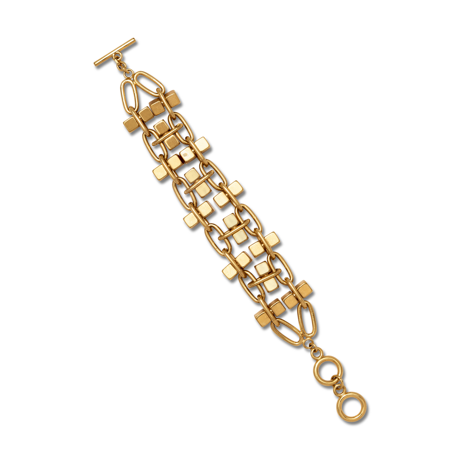 The Blockbuster Gold Chain Wider Bracelet by JAREDJAMIN Jewelry Online is an 18K gold plated link bracelet with bold, interlinked rectangular and square shapes, a toggle clasp, and a modern geometric design.