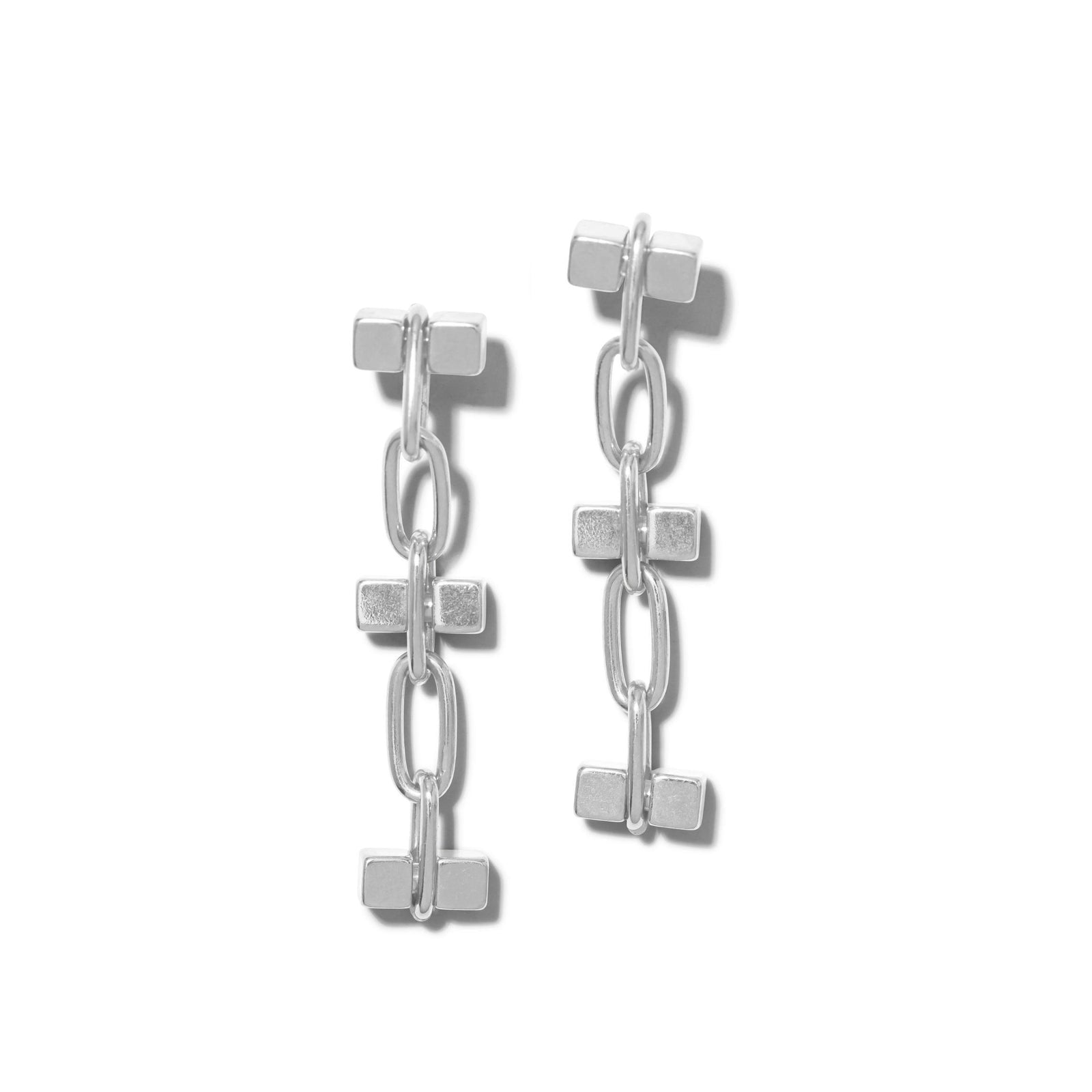 The Silver Blockbuster 3 Block Earrings by JAREDJAMIN Jewelry Online feature three silver-plated brass rectangular bars linked by oval chains for a modern, minimalist look. These dangle earrings have a shiny, polished finish and are shown on white.