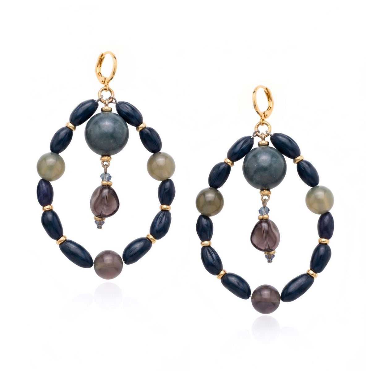 High-resolution studio product shot of the JAREDJAMIN Blue Bean Hoop Earrings against a white backdrop, showcasing the gold-plated lever back posts, the outer navy and blue lace agate beaded loops, and the central hanging smoky crystal drop pendants.