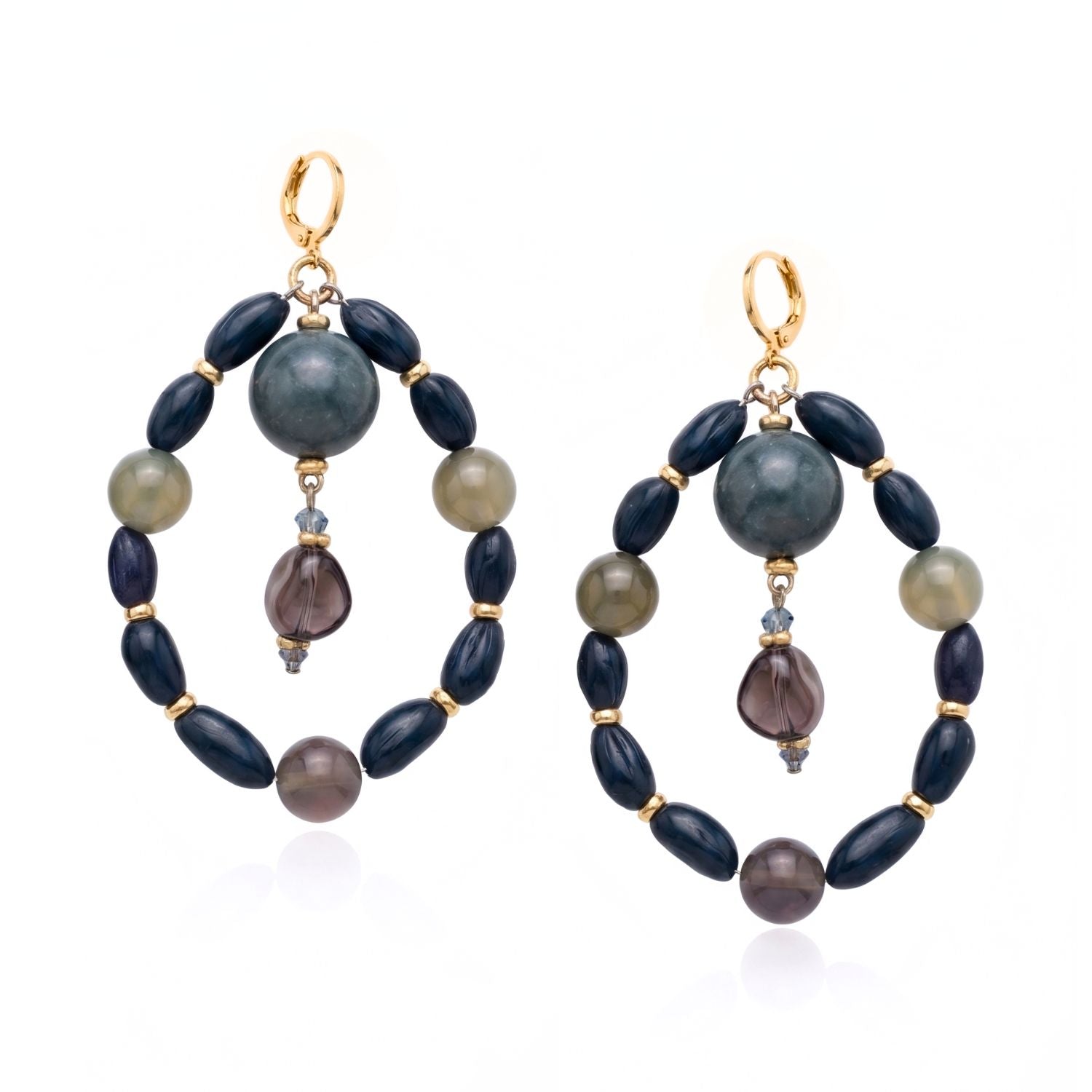 High-resolution studio product shot of the JAREDJAMIN Blue Bean Hoop Earrings against a white backdrop, showcasing the gold-plated lever back posts, the outer navy and blue lace agate beaded loops, and the central hanging smoky crystal drop pendants.