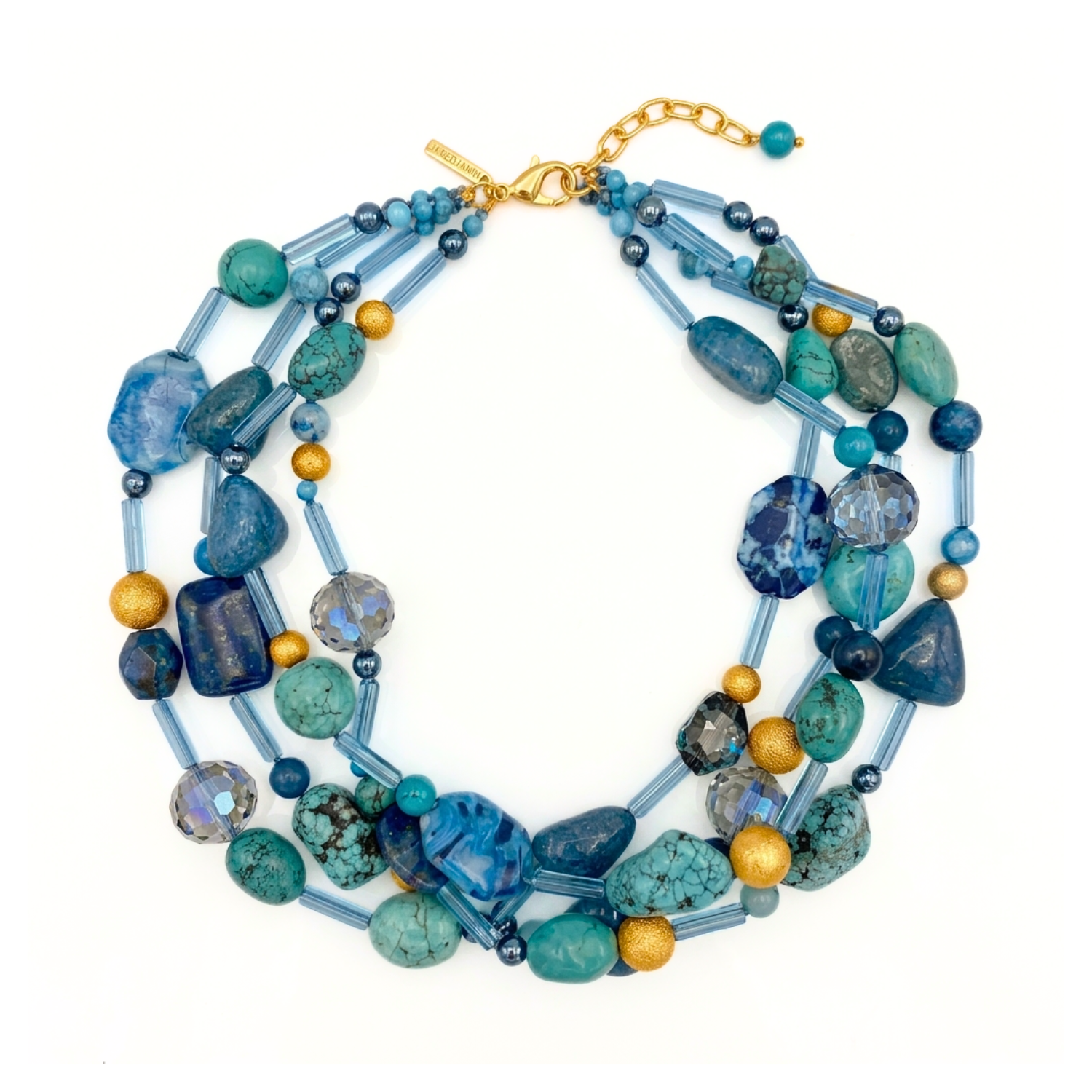 High-resolution studio product shot of the JAREDJAMIN Blue Reef Necklace displayed flat on a white background, highlighting its four-strand layered design featuring turquoise, blue agate, crystals, and gold stardust beads.