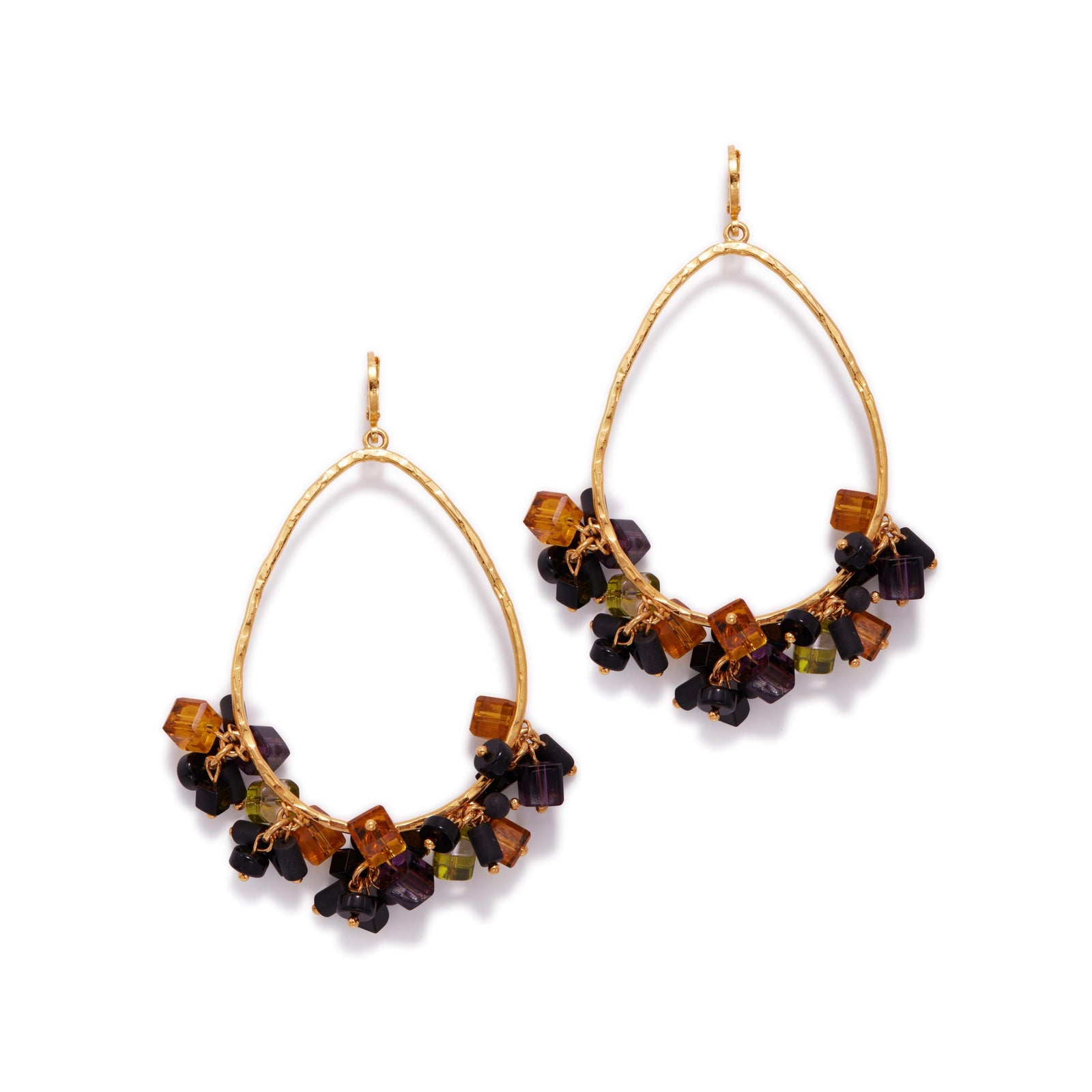 The Cubism Drop Loop Earrings by JAREDJAMIN Jewelry Online are large teardrop-shaped 18K gold plated hoops, featuring clusters of faceted glass beads in amber, black, olive green, and deep purple for a vibrant textured style.