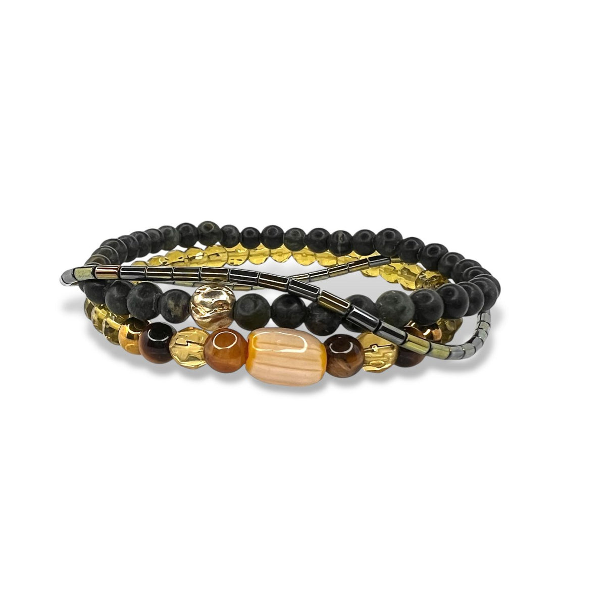 Detailed view of the three-piece Cadence bracelet Set by Jared Jamin, highlighting the contrast between the smooth Jasper, metallic Hematite, et light-catching Chartreuse beads