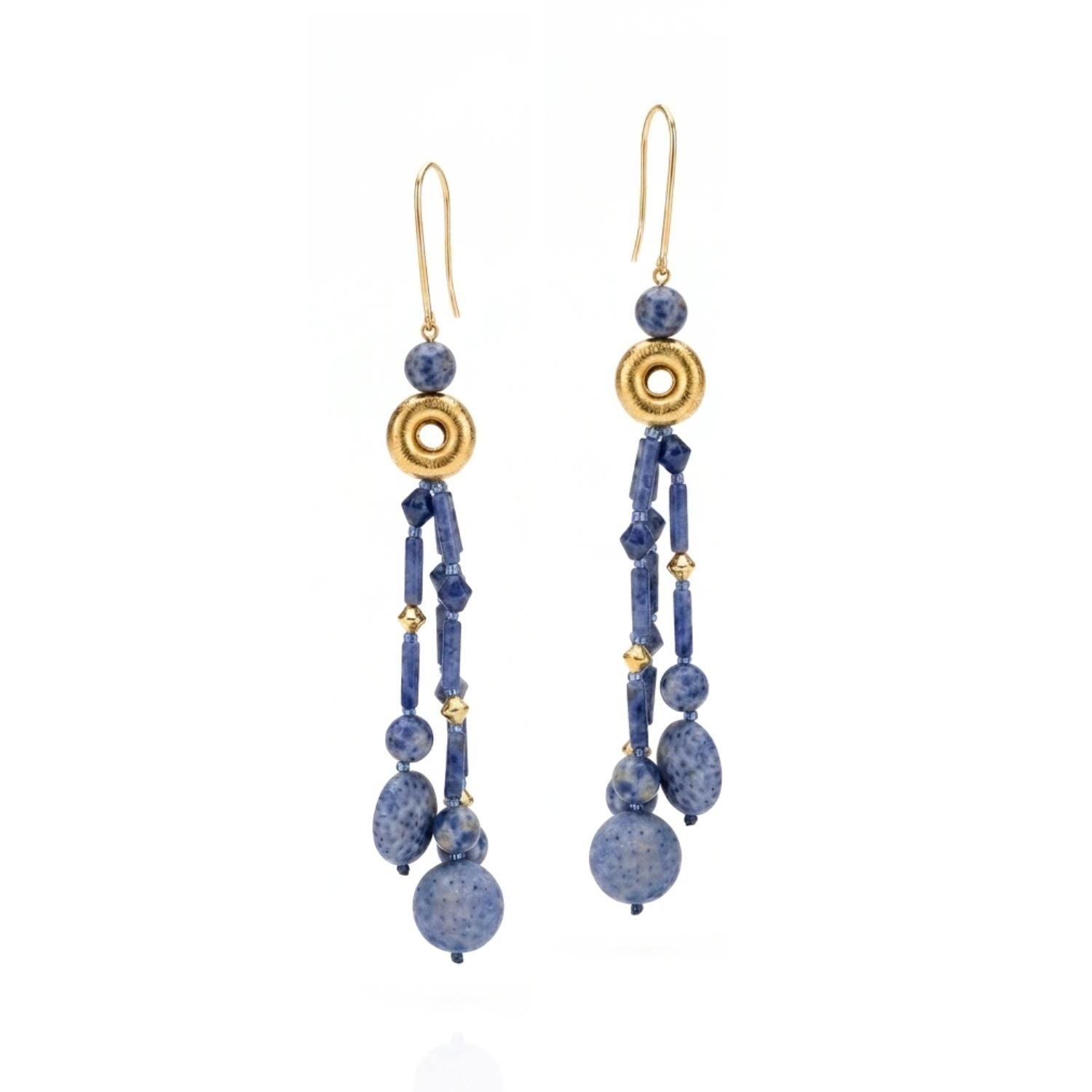 High-resolution studio product shot of the JAREDJAMIN Celeste Tassel Earrings against a white backdrop, showcasing the long 18k gold-plated french hooks, brushed donut beads, multi-shape blue sodalite strands, and coin-faceted coral endpoints.