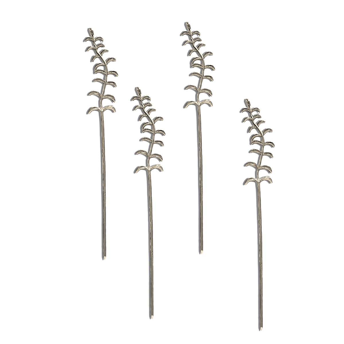 JAREDJAMIN Barware and More&#39;s Silver Thyme Cocktail Skewers Set features four silver-plated skewers with leaf-like designs, each boasting symmetrical, upward-curving extensions like stylized branches against a white backdrop for an elegant botanical touch.