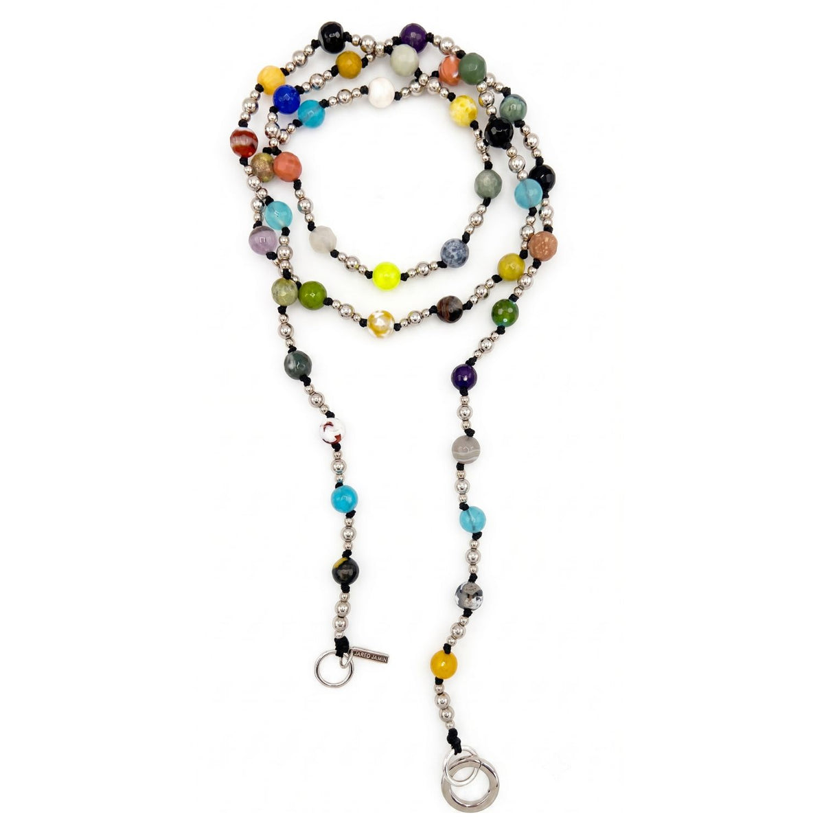 High-resolution studio product shot of the full 44-inch Prism cross-body phone lanyard opened flat on a white surface, displaying the complete rhythmic sequence of multicolored gemstones, black knots, and secure silver-toned hardware.