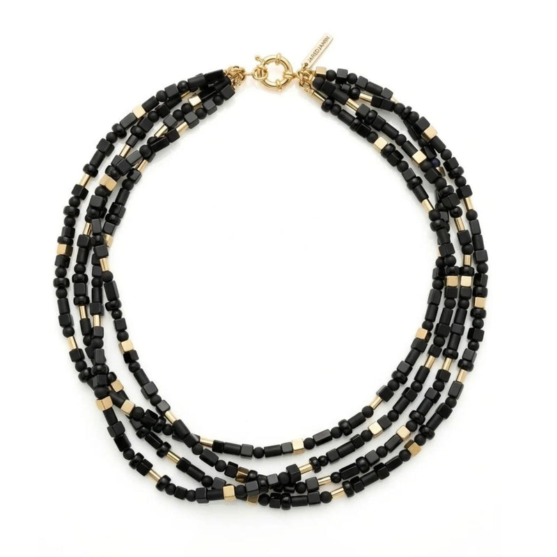 Full view of the Corrinne multi-strand black onyx beaded necklace on a white background, showing layered strands and the gold lobster clasp.