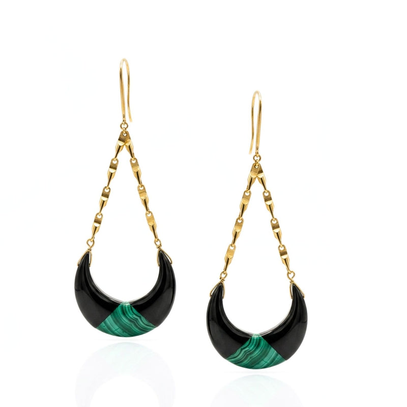 High-resolution studio product shot of the pair of Nox Crescent Dangle Earrings displayed flat against a white background, highlighting the black onyx, banded malachite inlay, 18k gold-plated links, and French hooks.
