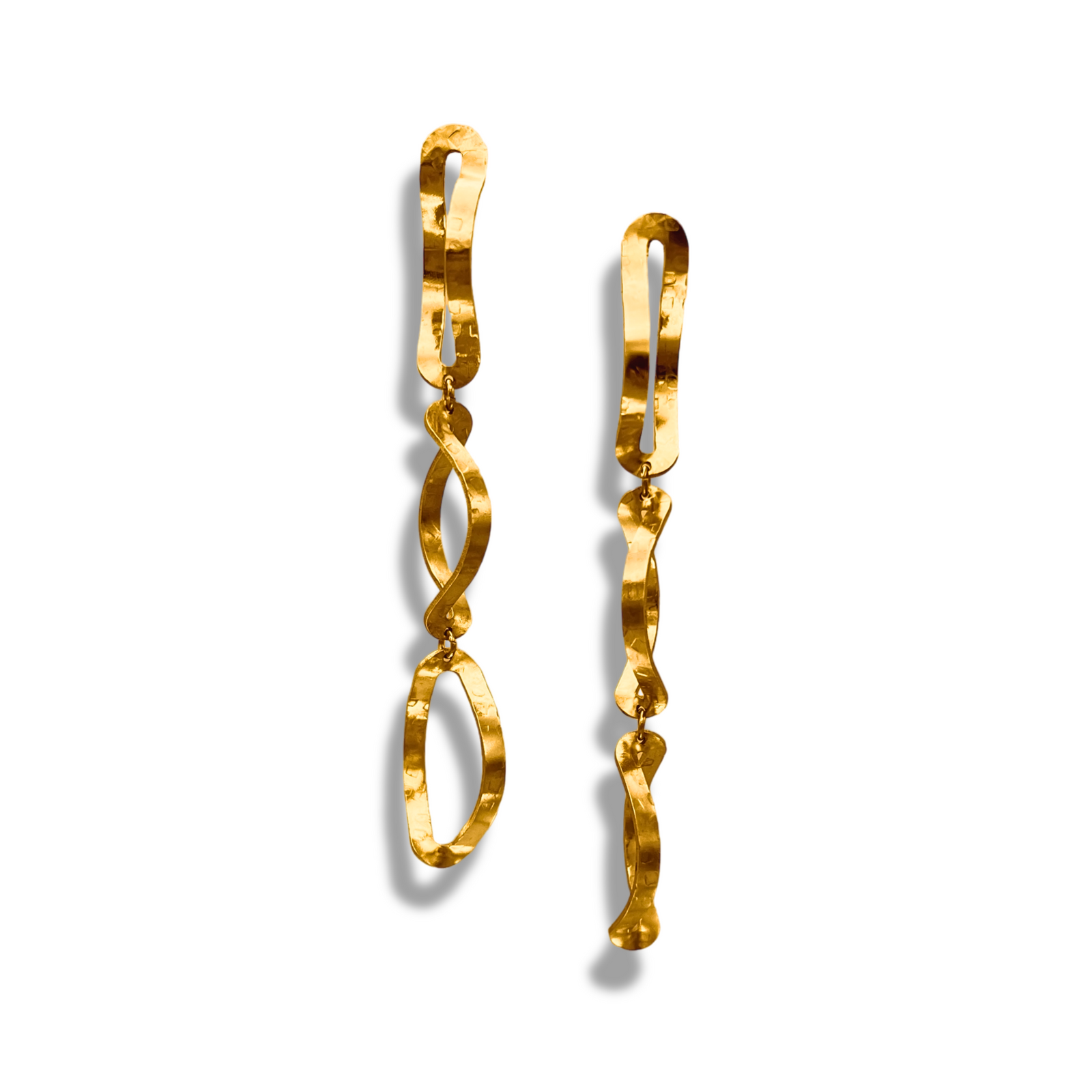 The Gold Darla Dangle Earrings by JAREDJAMIN Jewelry Online feature mismatched, 18K gold-plated ovals with unique textures and shapes, dangling from flat hooks—a modern Los Angeles Design Studio creation.