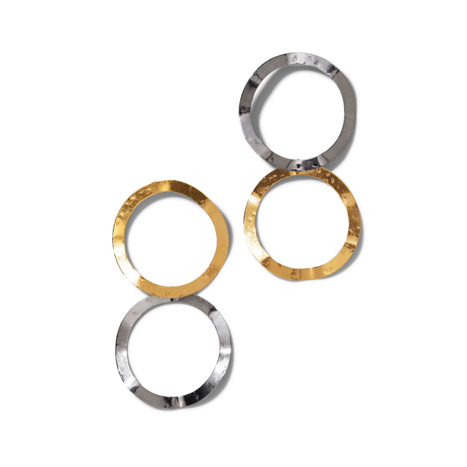 A set of gold and silver rings, beautifully designed to pair with JAREDJAMIN Jewelry Online's Duet Drop Post Earrings.