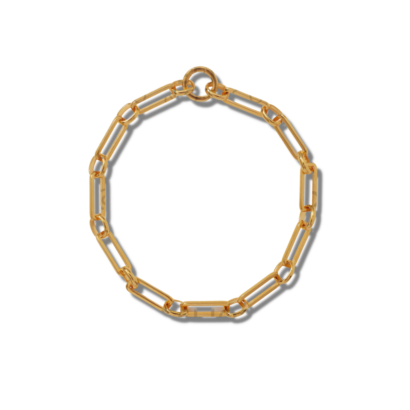 The Gold Bravura Link Necklace by JAREDJAMIN Jewelry Online features elongated rectangular links and a circular clasp, arranged in a neat circle on a white background, with its polished 18K gold finish casting a soft shadow to the right.