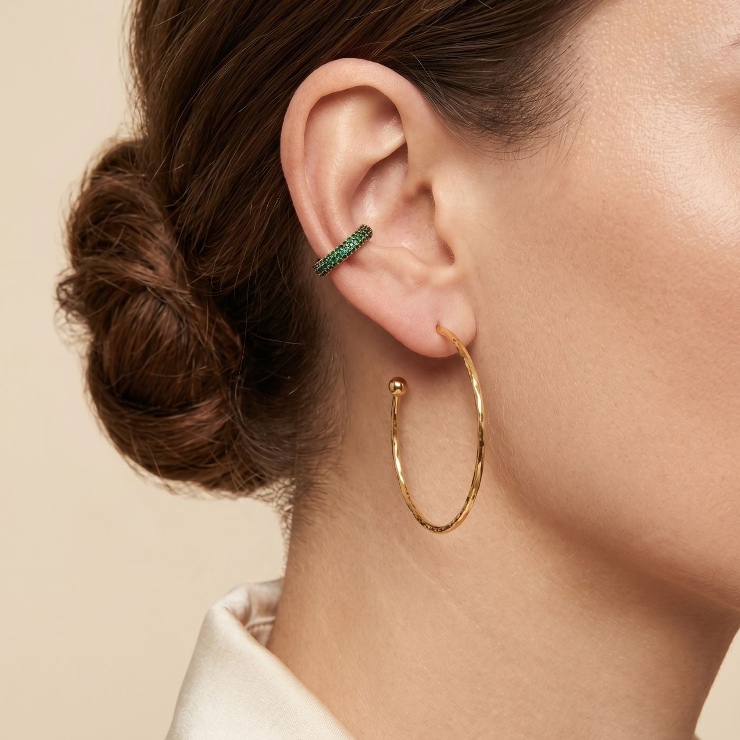 The Gold Small Hooptastic Hoop Post Earrings by JAREDJAMIN Jewelry Online feature a minimalist design with thin 18K gold plate hoops, each accented by a small sphere opposite the post, shown against a white background for an elegant look.