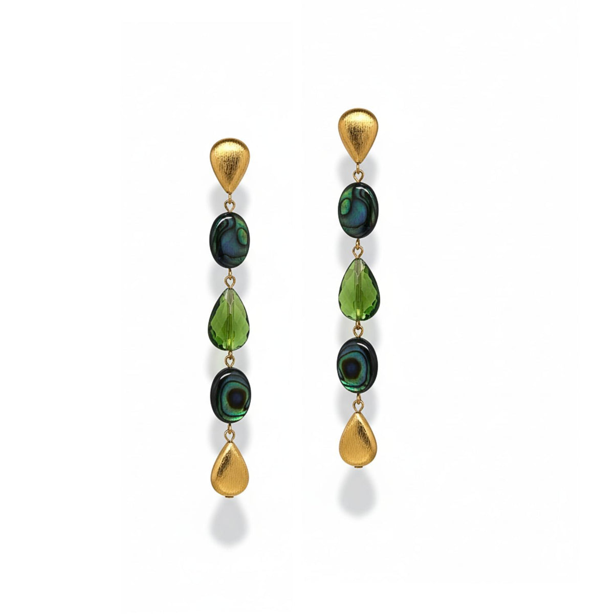 The Emerald City Earrings by JAREDJAMIN Jewelry Online feature gold teardrop studs, round abalone shell beads, green quartz stones, and gold pendants, all elegantly linked in a vertical cascade.