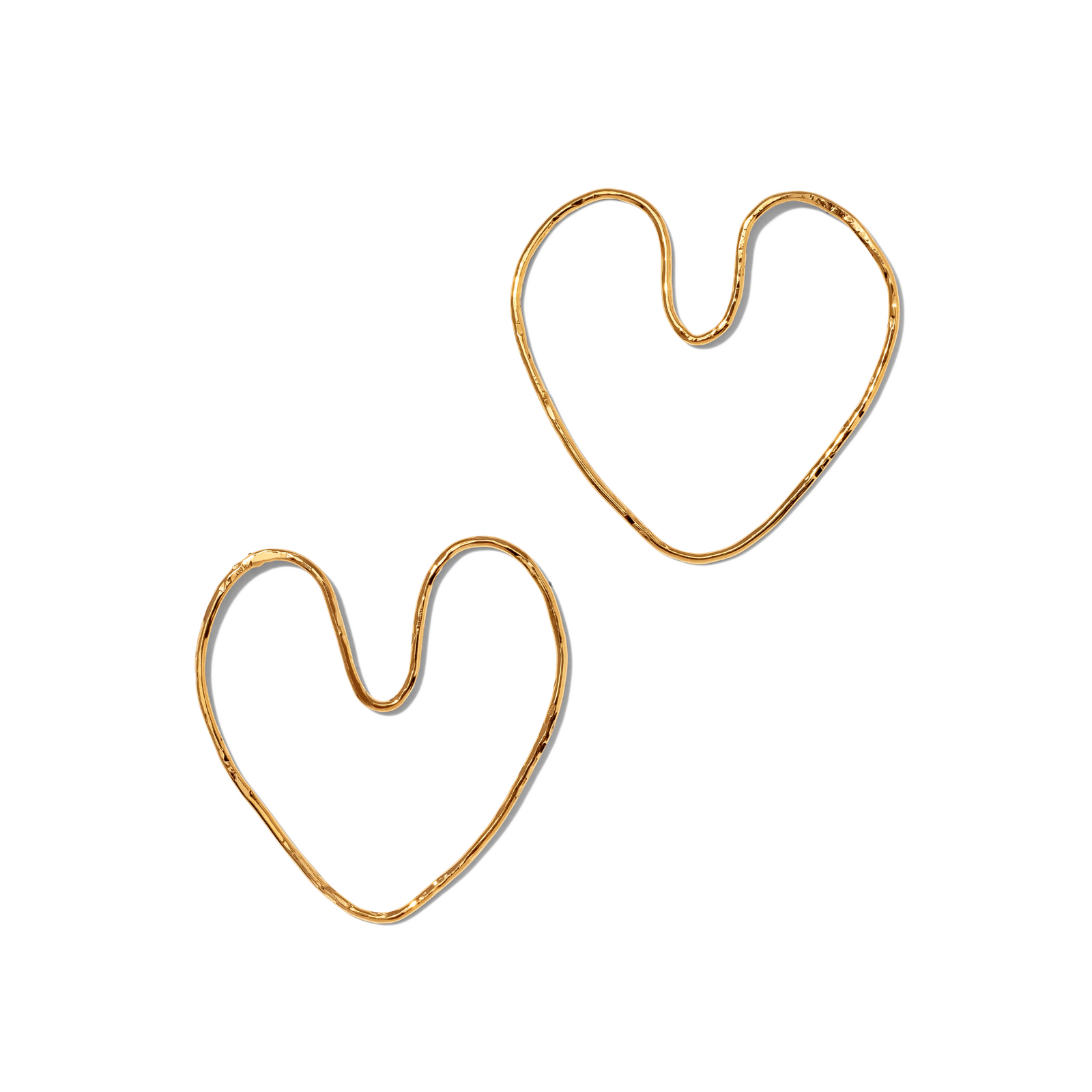 Gold Large Fluttering Heart Earrings by JAREDJAMIN Jewelry Online are shown on a white background. The 18K gold-plated, handmade wire hearts feature delicate, polished outlines with a unique asymmetrical shape.