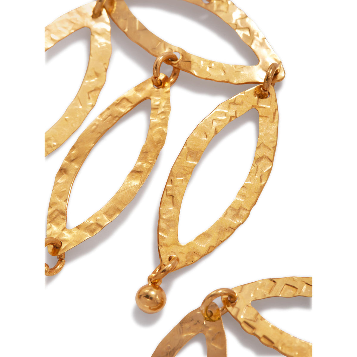 Close-up of JAREDJAMIN Jewelry Online's Gold Eyelet-Chandelier Earrings: 18K gold plated, hammered metal, elongated oval links with small rings and bead accents. Lever back fastenings enhance the handcrafted look against a white background.
