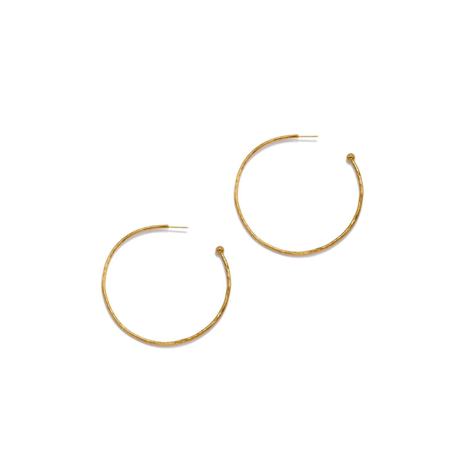 The Gold Small Hooptastic Hoop Post Earrings by JAREDJAMIN Jewelry Online feature a minimalist design with thin 18K gold plate hoops, each accented by a small sphere opposite the post, shown against a white background for an elegant look.