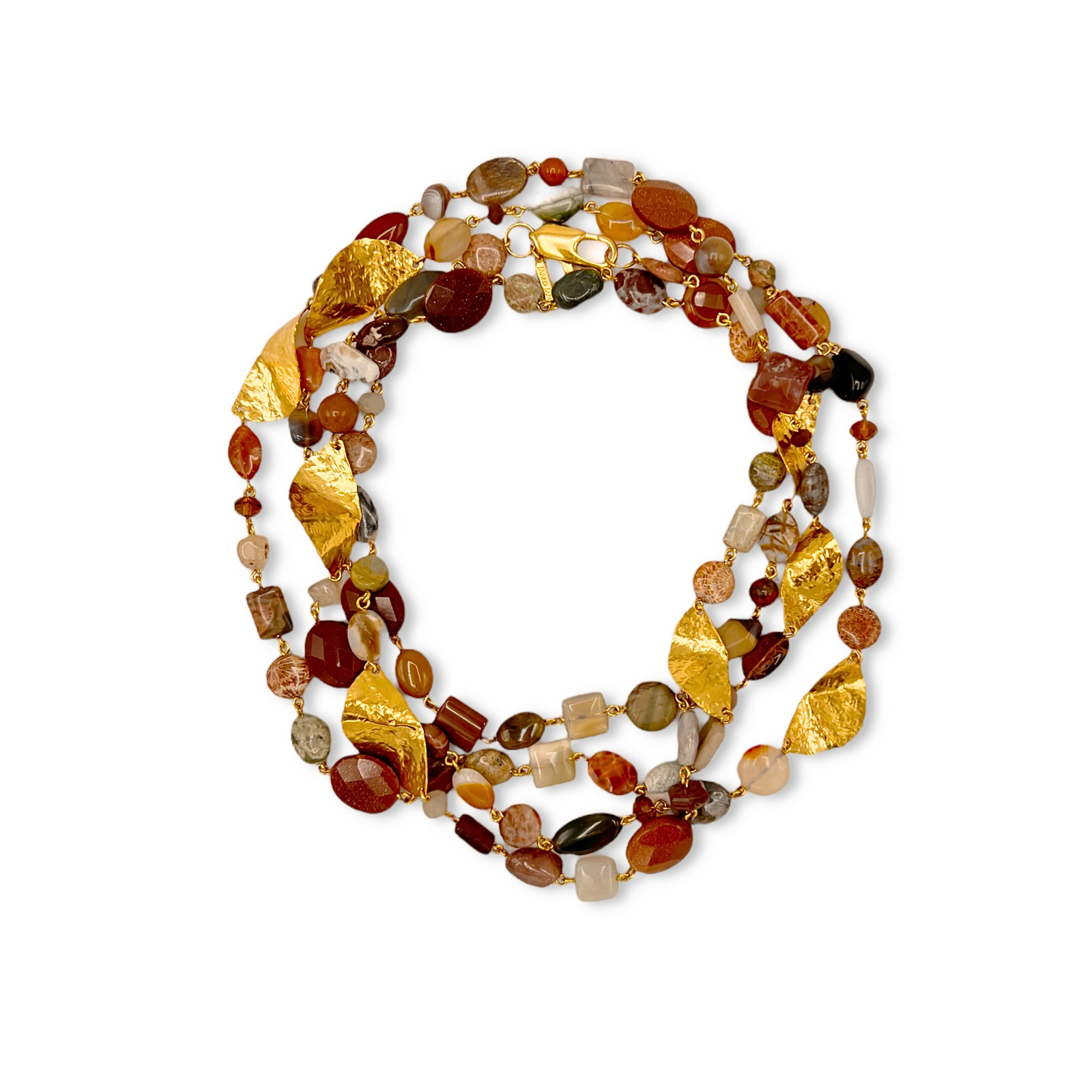 The Geo Twist Gemstone Linked Necklace by JAREDJAMIN Jewelry Online showcases earthy jasper stones in brown, amber, cream, and gray with textured 18K gold-plated charms for a layered artisanal look on a white background.