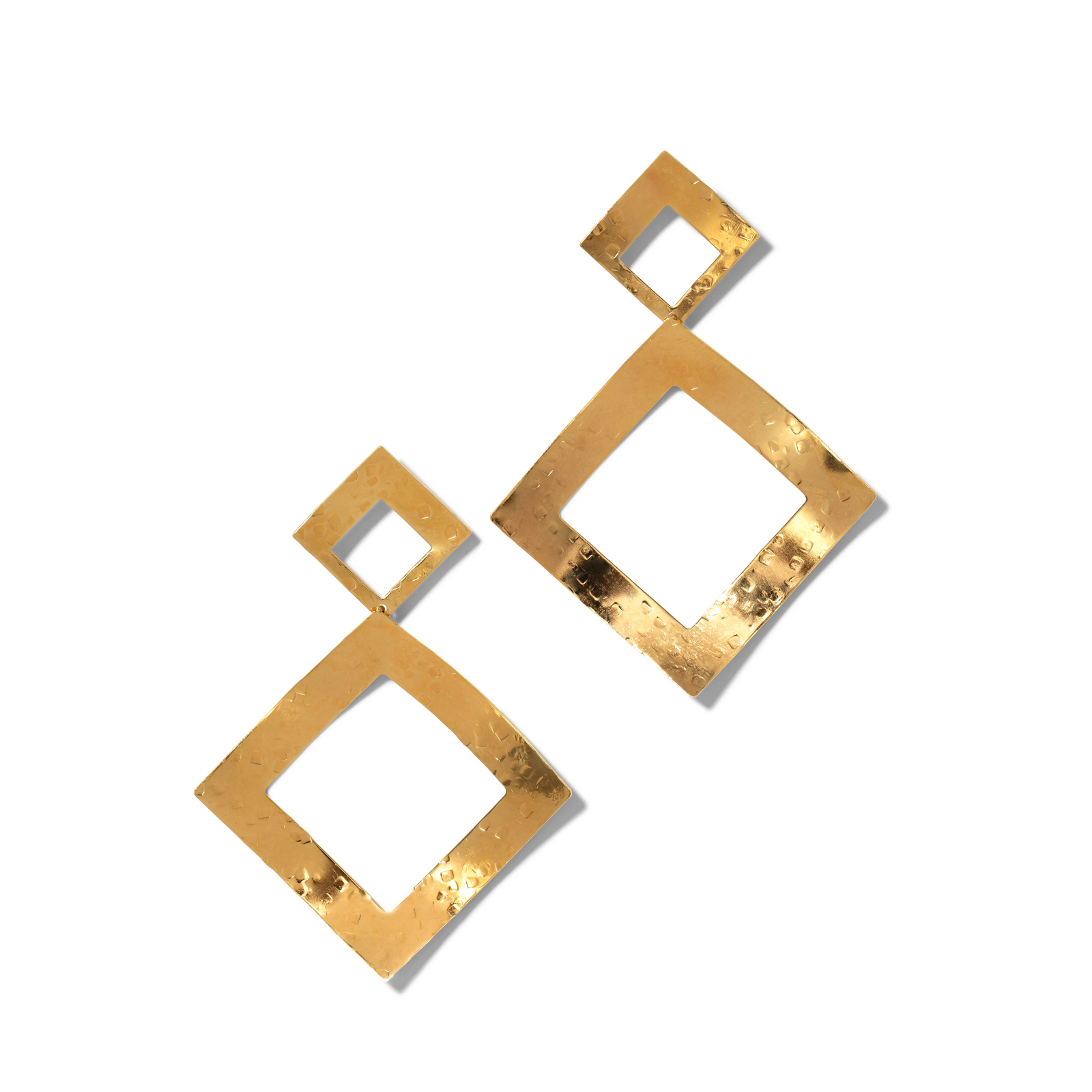 The Gold Toscana Diamond Drop Post Earrings by JAREDJAMIN Jewelry Online feature two 18K gold plated, hammered open diamond-shaped frames in a modern geometric design. The larger diamond dangles from the smaller for a chic look.