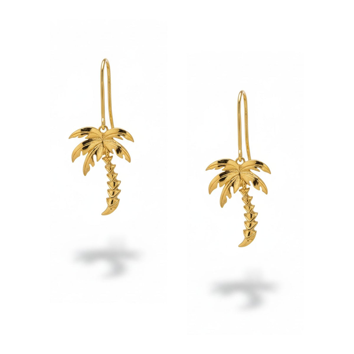 The Gold Angeleno Palm Hook Earrings by JAREDJAMIN Jewelry Online feature palm tree shapes in 18k gold plating with detailed fronds and textured trunks, and French hooks for easy wear.