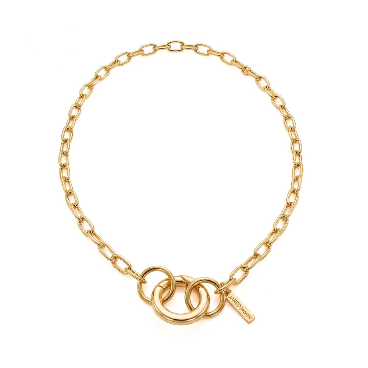 Meticulously hand-assembled in our West Hollywood studio, this small-batch necklace links interlocking gold rings and a geometric “ARMANI” tag with sculptural oval connectors. Eco-conscious 18k plating refracts light. Style Note: punctuates classics or evening looks.