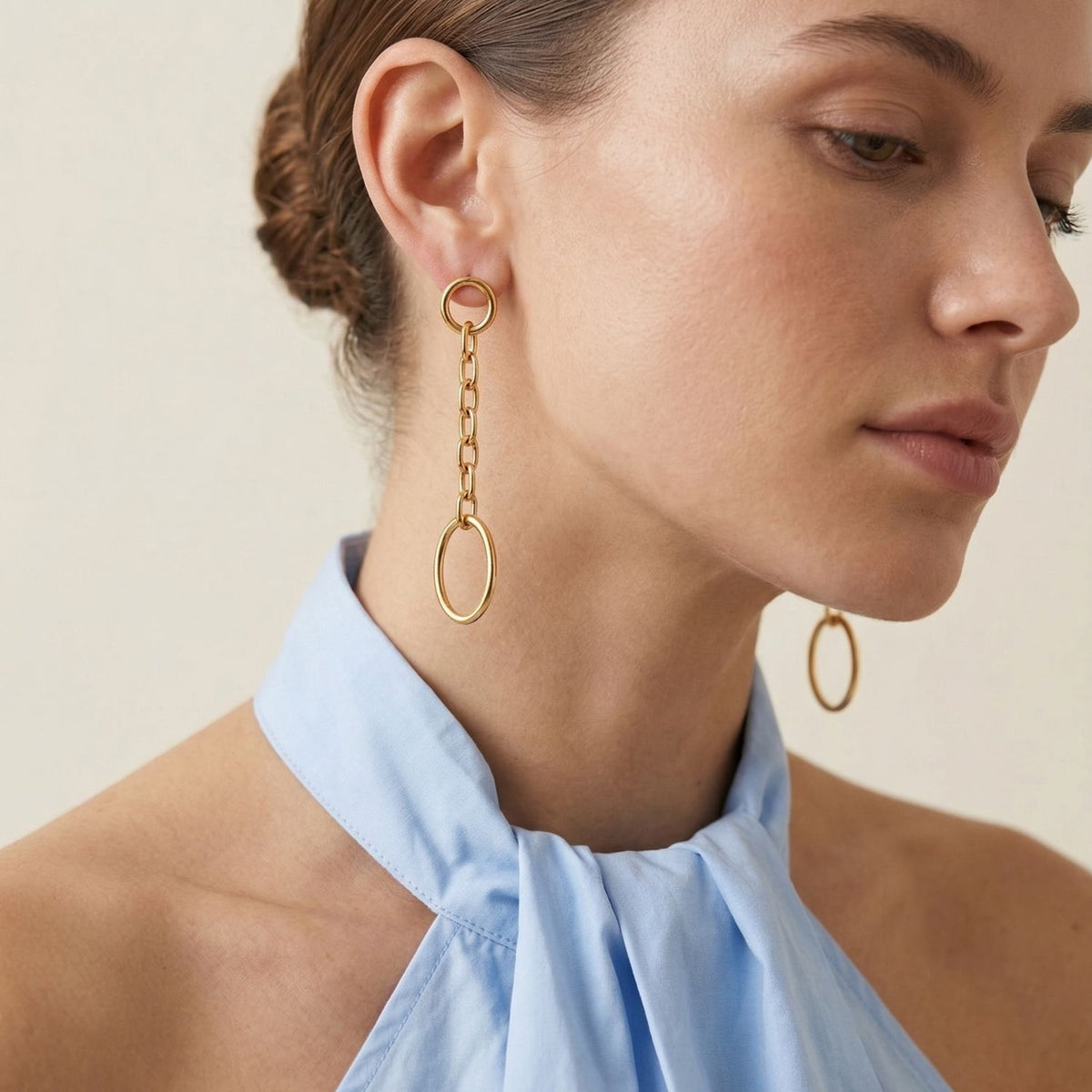 Gold Chain Reaction Drop Post Earrings and an 18K gold plated necklace from JAREDJAMIN Jewelry Online, featuring artisanal small-batch craftsmanship West Hollywood, sustainable luxury, and signature brushed finishes, shown on a model.