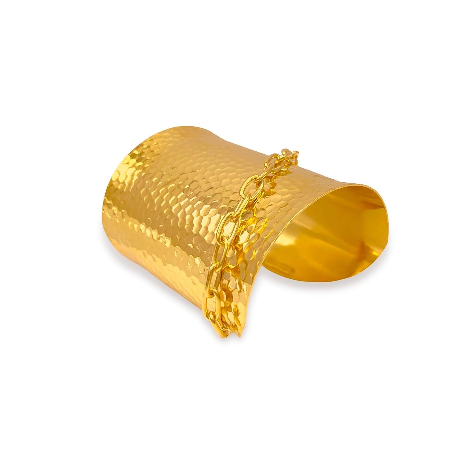The Galilea Textured Cuff Bracelet by JAREDJAMIN Jewelry Online features a hammered finish, diagonal chain sash detail, reflective gold-plated surface, and an open back for easy wear.