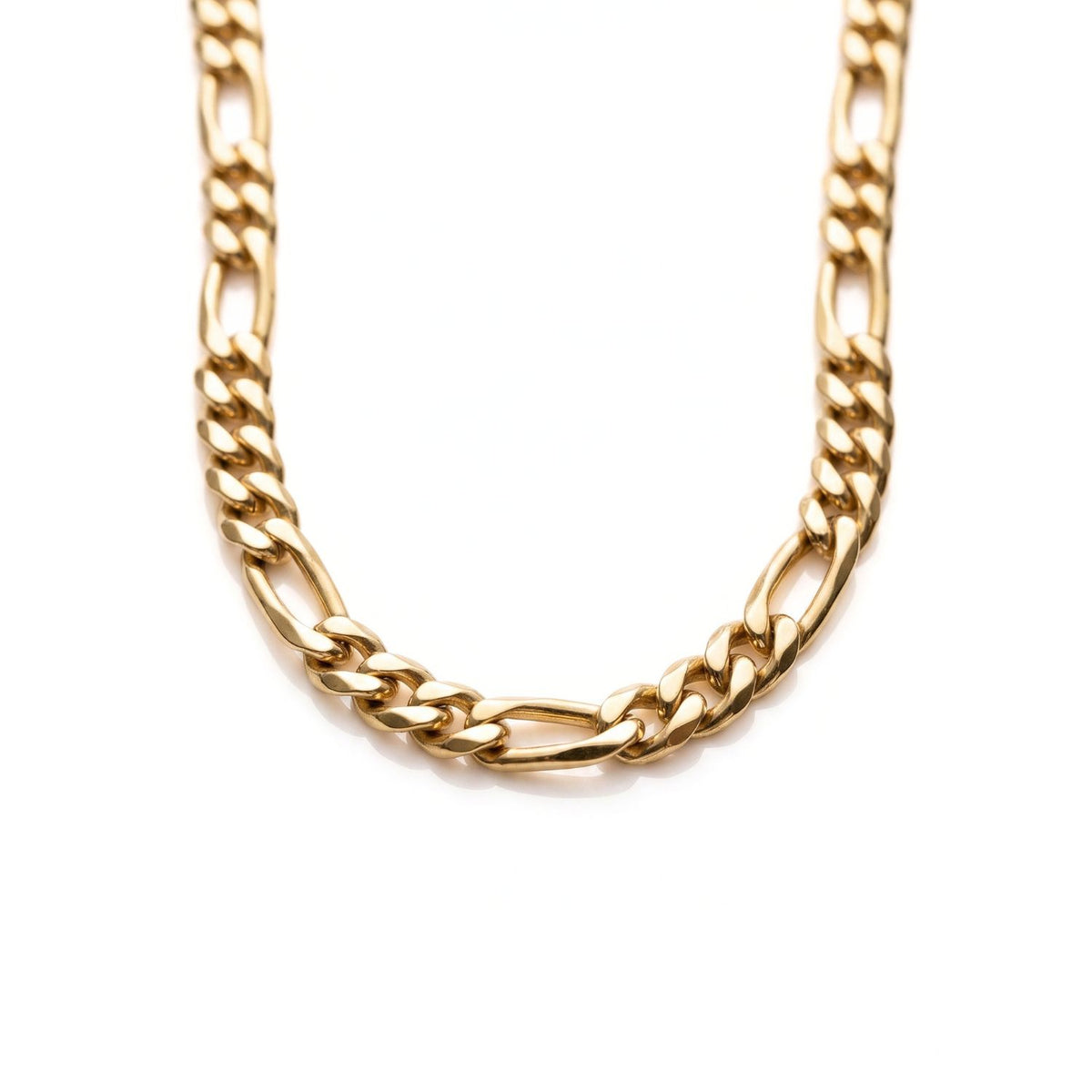 Sharp macro studio layflat shot focusing tightly on the 3.6mm width of the JAREDJAMIN Gold Finley-Figaro Chain, showcasing the classic alternating 3-to-1 link pattern and high-polish 18k gold-plated finish.