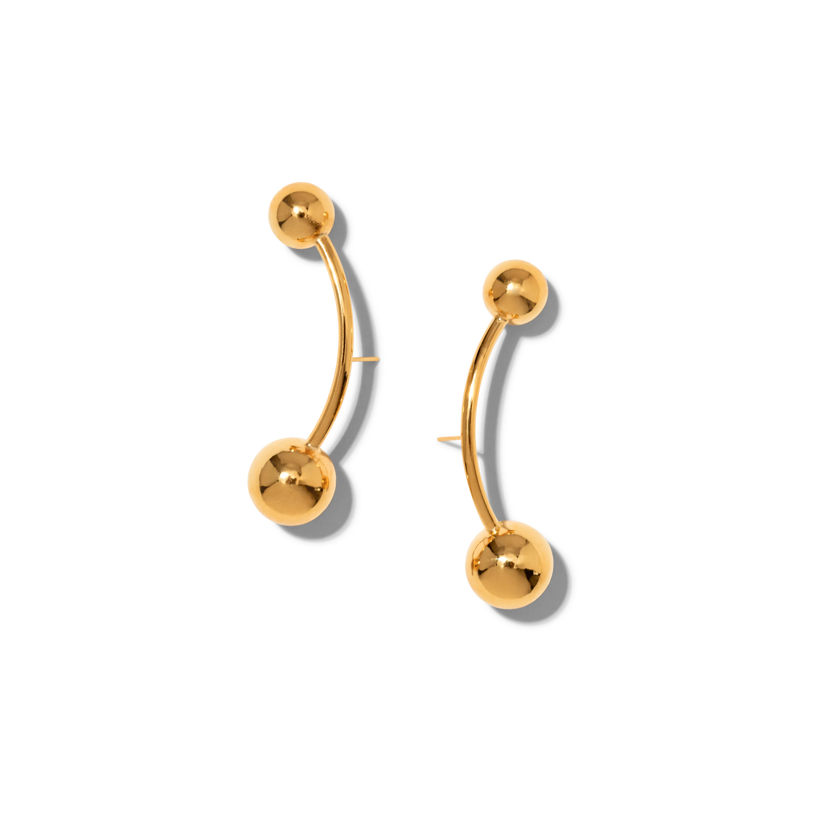 The Gold Orbita Nova Post Earrings by JAREDJAMIN Jewelry Online feature gently arched, 18K gold-plated bars with shiny gold spheres on each end, shown on a white background with subtle shadows.