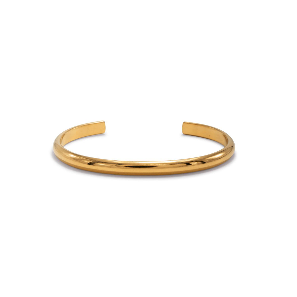 The Gold Parker Cuff refracts quiet luxury in hand-sculpted 18k gold, assembled in our West Hollywood studio. Crafted in small batches with eco-conscious care, its open silhouette punctuates any look—Style Note: from tonal knits to after-dark tailoring.