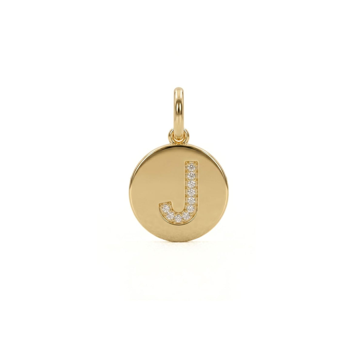 Hand-assembled in our West Hollywood studio, this round gold pendant punctuates any look with a raised, pavé cubic zirconia “J.” Crafted in small batches with eco-conscious intent. Style Note: refracts from tailored shirting to after-dark layers.