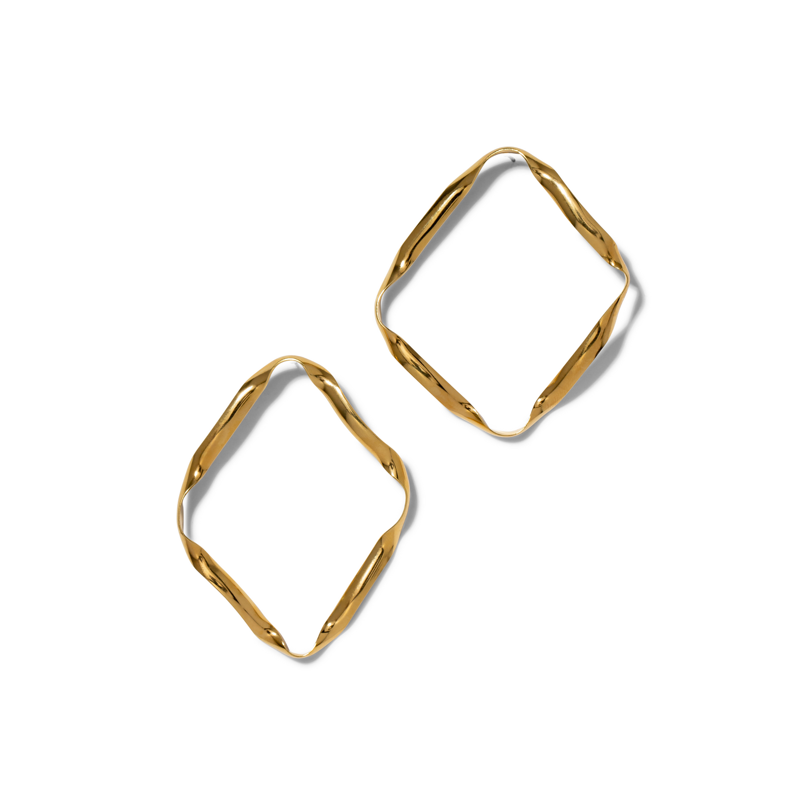 Two Gold Ribbonelle Post Earrings by JAREDJAMIN Jewelry Online, featuring hand-crafted wavy square shapes and shiny 18K gold plating, are displayed on a white background for a distinctive modern look.