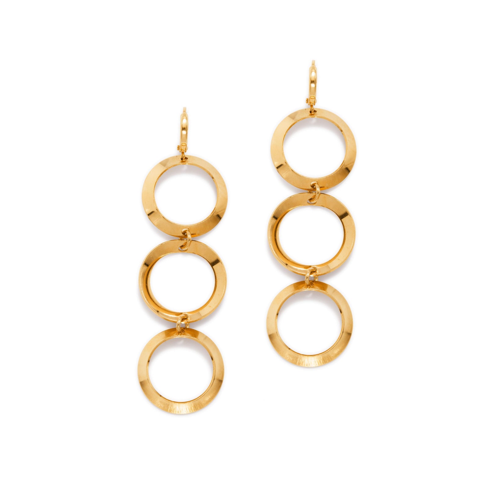 The Gold Rimini Loop Earrings from JAREDJAMIN Jewelry Online are 18K gold plated dangle earrings with three interlocking shiny hoops linked vertically for a cascading effect. Lightweight with hinged hoop closures. Plain white background.