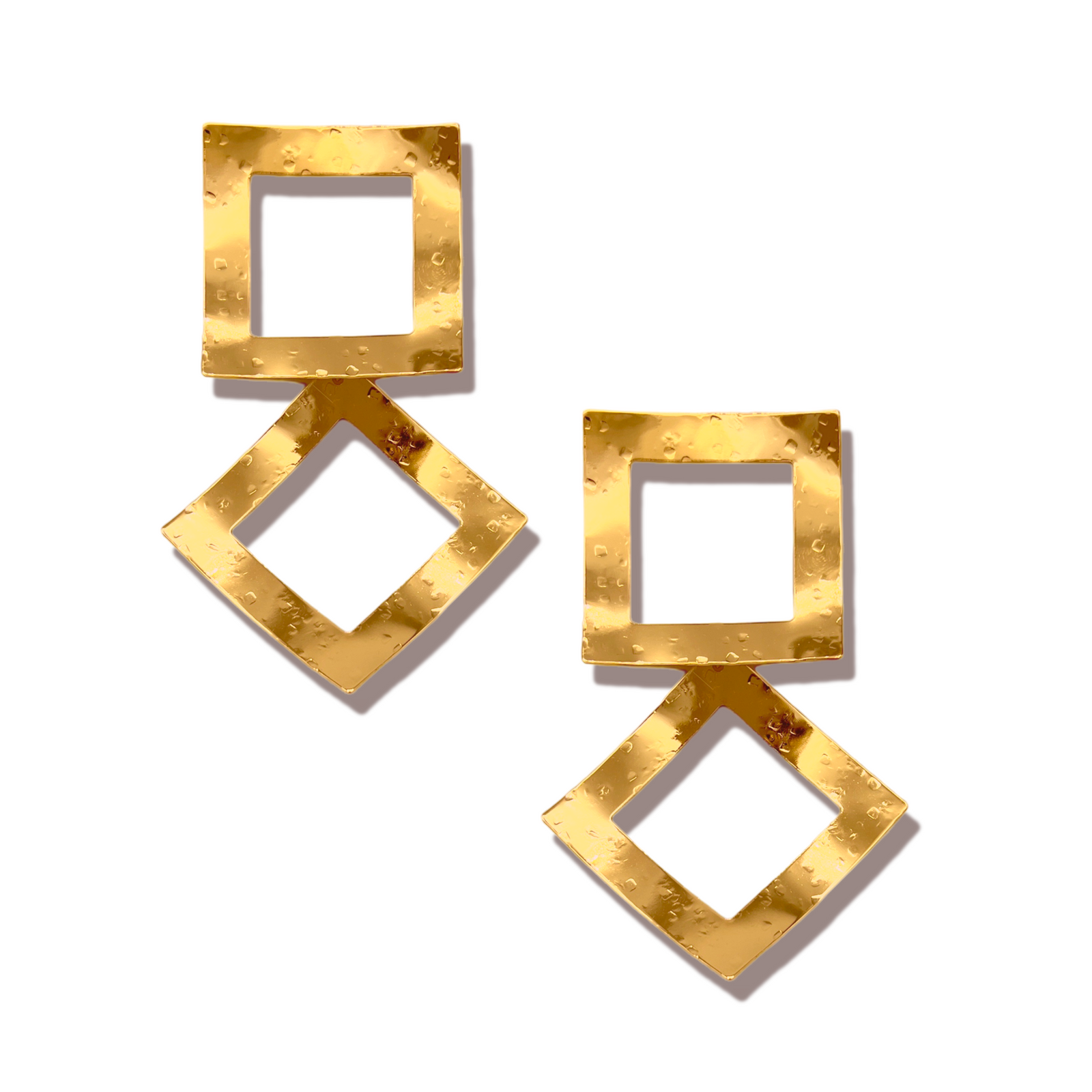 The Gold Toscana Large Square Post Earrings by JAREDJAMIN Jewelry Online feature two linked open squares—one upright, one tilted—in 18k gold-plated metal with a hammered, textured finish for a reflective, eye-catching look.