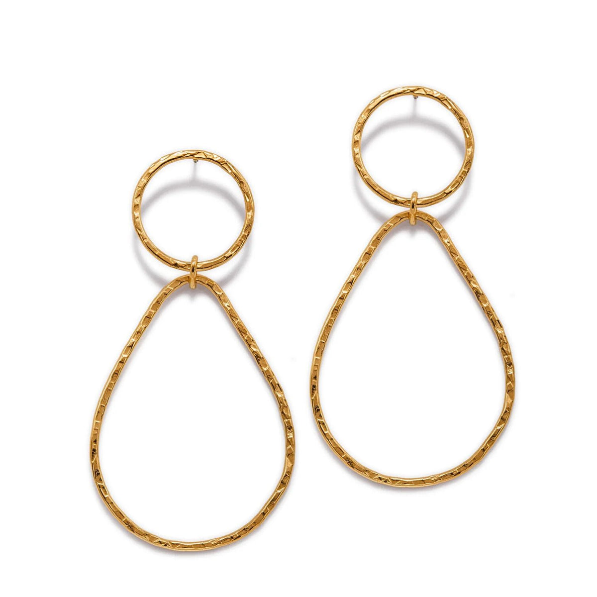 Gold Textured Tear Post Earrings from JAREDJAMIN Jewelry Online feature a small round top linked to a larger tear-shaped hoop. Their minimalist, elegant design spotlights the polished gold finish and hammered brass texture.