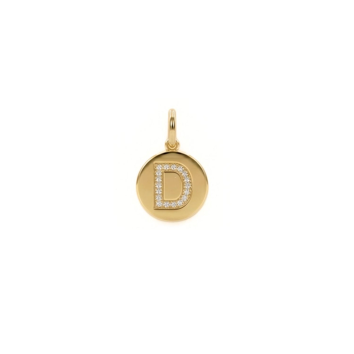 Hand-assembled in our West Hollywood studio, this round gold pendant sculpts a raised pavé “D,” each cubic zirconia refracting light with ease. Crafted in eco-conscious small batches. Style Note: punctuates crisp shirting or evening knits alike. Shown on white.