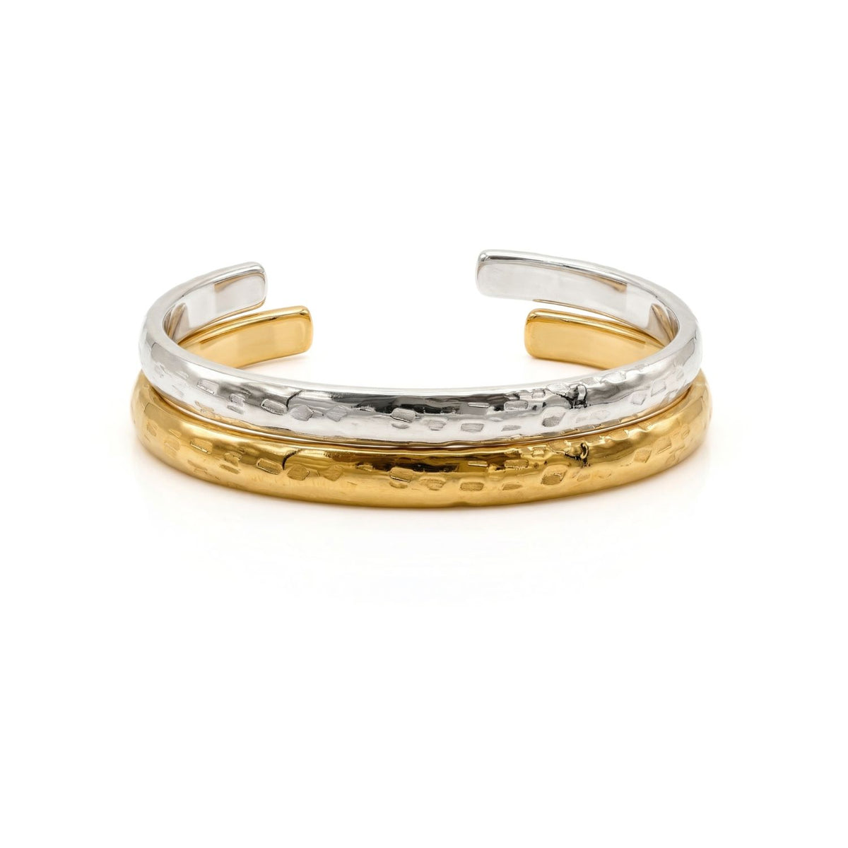 The Parker Textured Cuff juxtaposes hand-hammered silver and luminous 18k gold plating, each sculpted and stacked in our West Hollywood studio. Crafted in small, eco-conscious batches. Style Note: punctuates denim or elevates tailored evening looks.