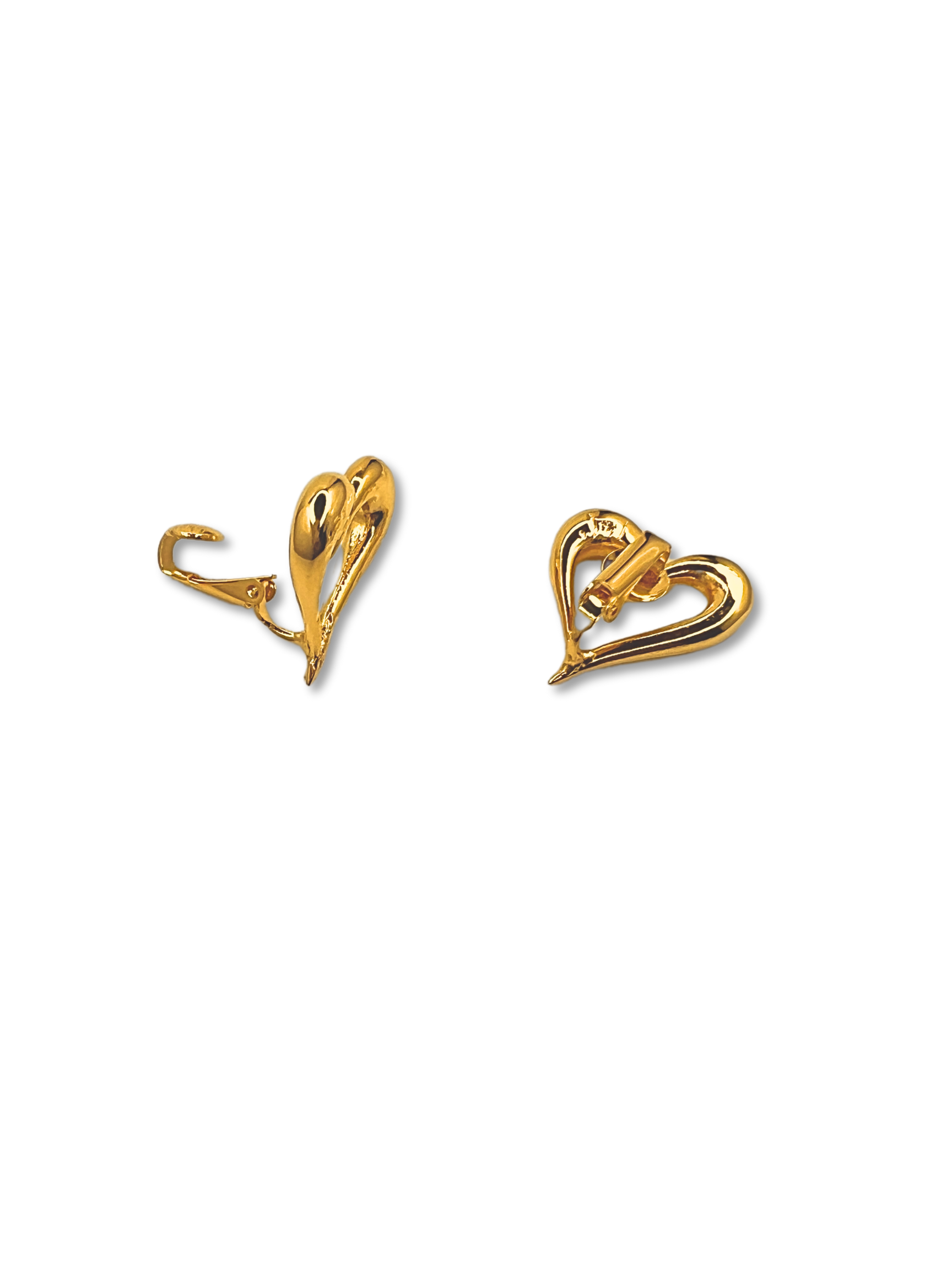 JAREDJAMIN Jewelry Online's Heartfelt Earrings capture timeless romance with their gold, heart-shaped design. One curves left, the other right, each with a smooth surface and hollow center on a white background—an unforgettable gift for any occasion.