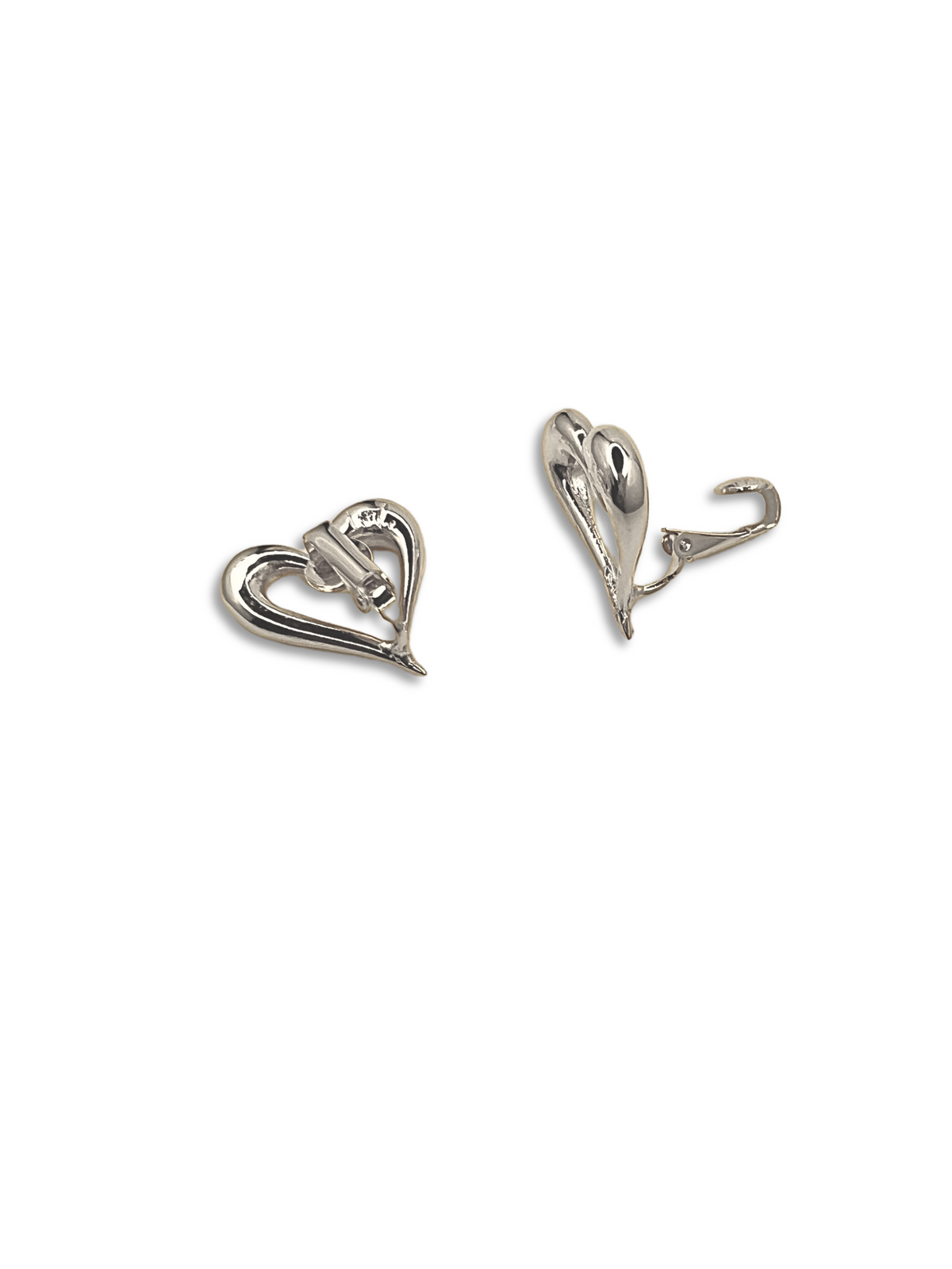 Heartfelt Earrings by JAREDJAMIN Jewelry Online offer a modern twist on timeless romance. These silver, heart-shaped earrings feature sleek loops, one open and one closed, with hook closures. Against a plain white backdrop, they make an unforgettable gift for any occasion.