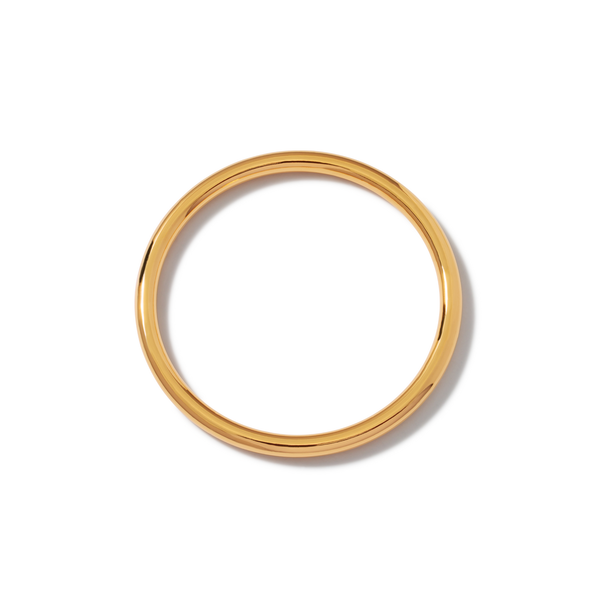 The Heavenly Hoop Bangle Pendant from JAREDJAMIN Jewelry Online shines on a white background, ideal for stacking with bangles or pairing with gold and silver charms.