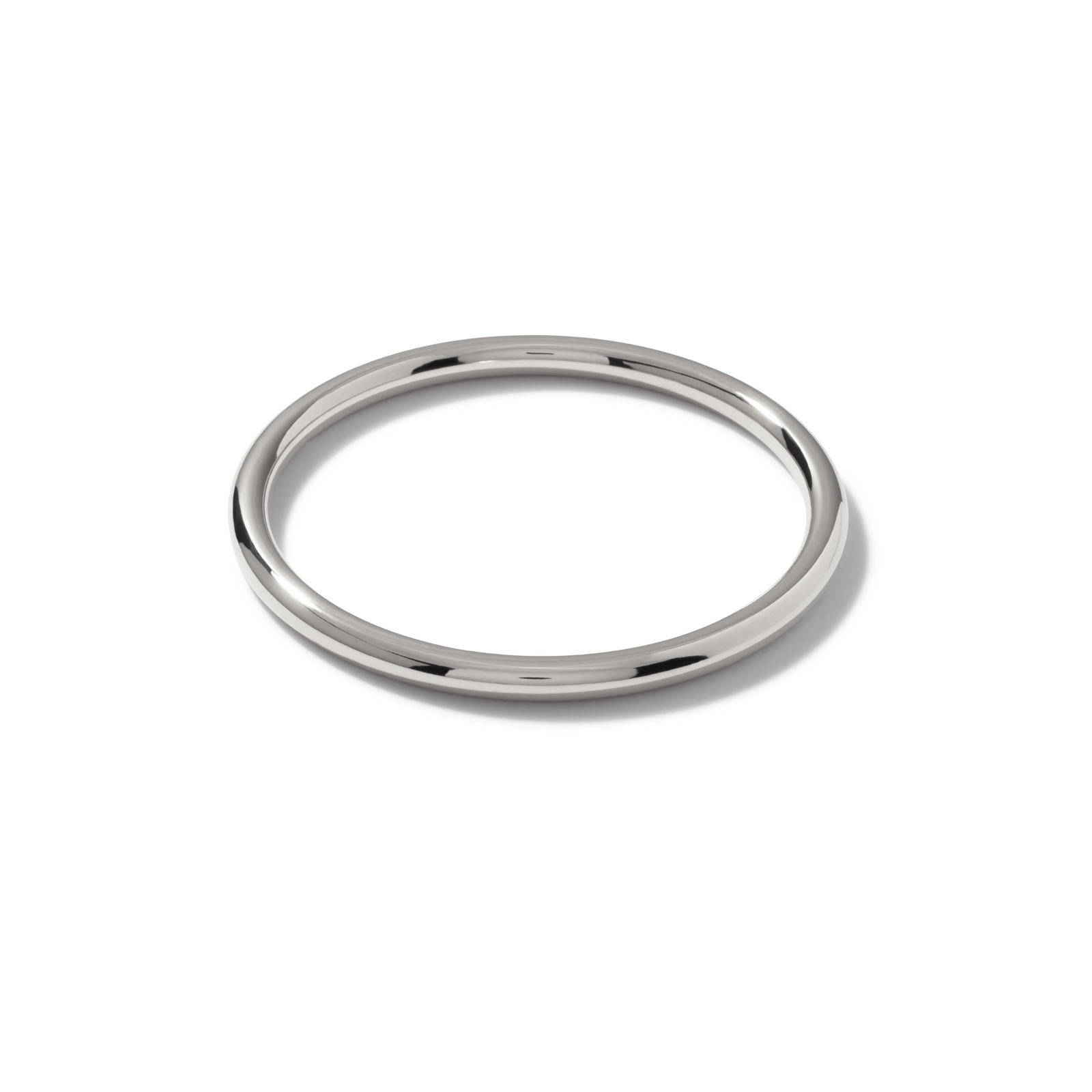 The Heavenly Hoop Bangle Pendant from JAREDJAMIN Jewelry Online shines on a white background, ideal for stacking with bangles or pairing with gold and silver charms.