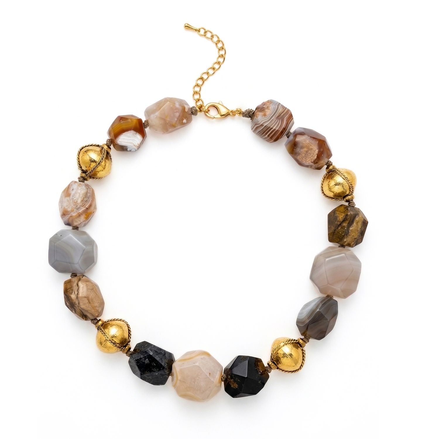JAREDJAMIN Isolde Agate Necklace: A full view of the hand-knotted necklace featuring chunky, asymmetrical faceted agate pebbles in earthy grey, brown, and black tones with 18k gold-plated brass accents.