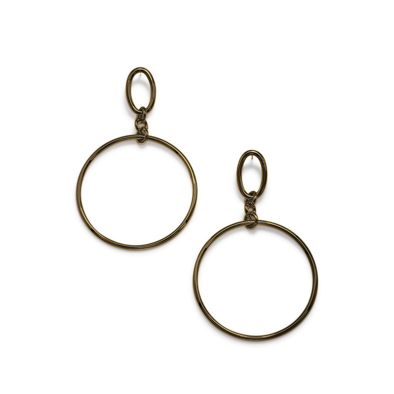 High-resolution studio product shot of the JAREDJAMIN Antique Ophelia Drop Hoop Post Earrings on a white background, highlighting the dark bronze patina on the raw brass oval post and large circular drop.