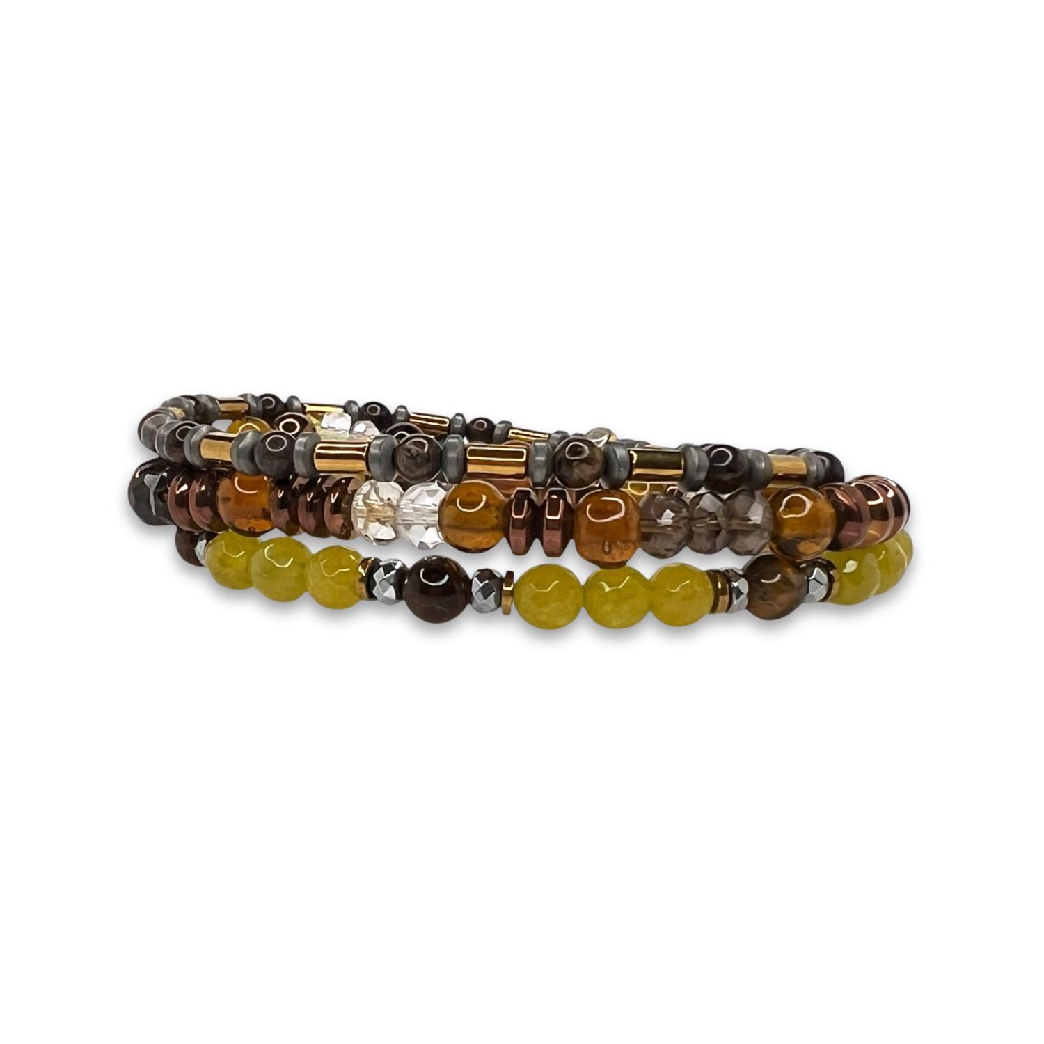The Canyon Country Bracelet Set by JAREDJAMIN Jewelry Online features two stretch bracelets: one with yellow, brown, clear, and metallic gray beads, and the other with dark amber and silver beads in various shapes for a striking look.